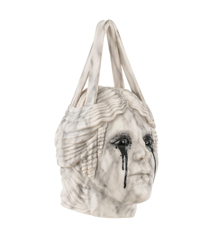 White faux marble handbag accented with strong dark veining