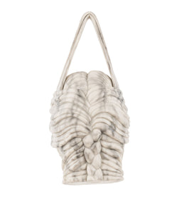 White faux marble handbag accented with strong dark veining