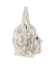 White faux marble handbag accented with strong dark veining